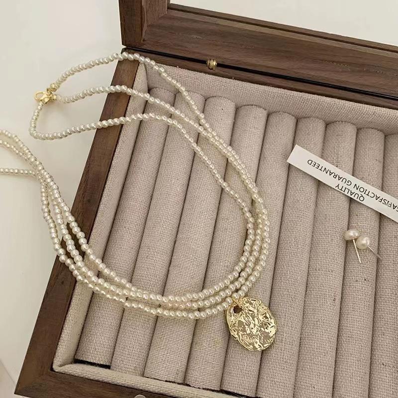 Multi-layer pearl necklace advanced design sense niche collarbone chain new female fashion personality temperament necklace